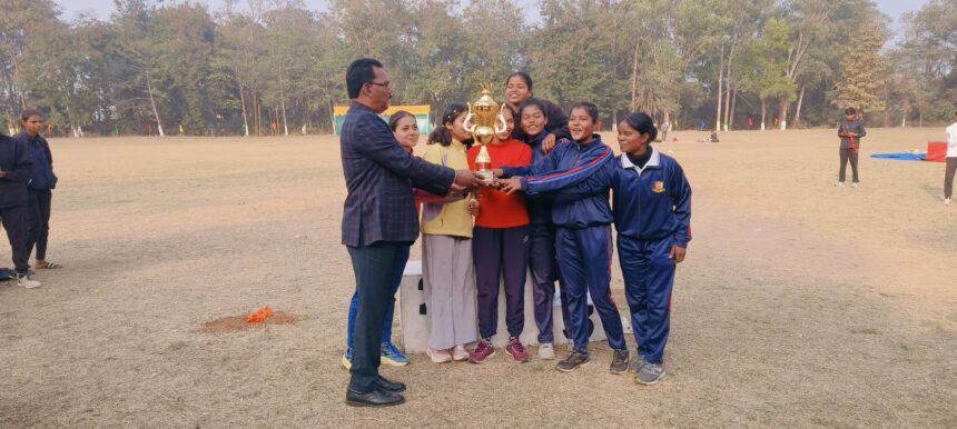 Principal of St Columbas taking photos with the students